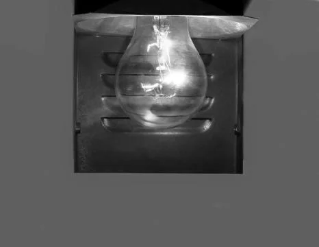 Burning electric lamp Stock Photos