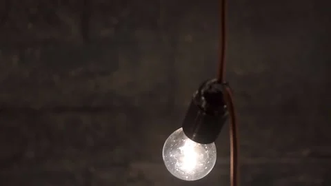Burning electric lamps on the wire Stock Footage 101091376