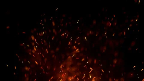 Burning embers glowing flying away particles over Stock Footage 90010554