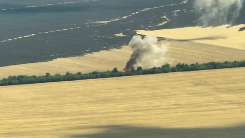 Burning fields of Kherson region 2022 Stock Footage 221514792