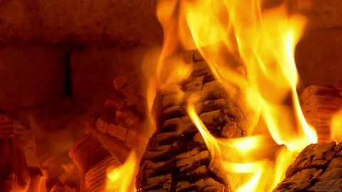 Burning fire and logs in stoves Stock Footage 78725939