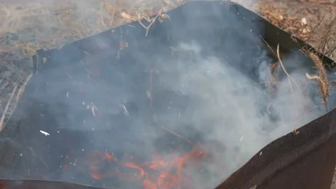 Burning fire and smoke in a garbage barrel Video stock 132028387