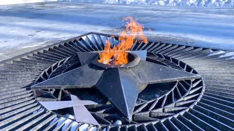 Burning fire and star - symbol of memory about Second World War. Stock Footage 152556083
