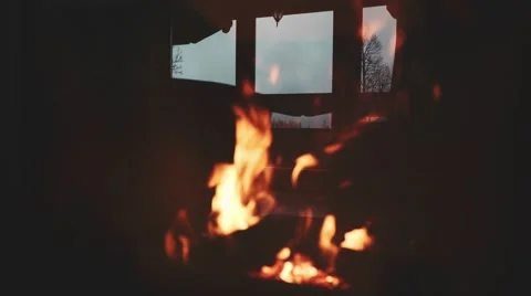 Burning Fire and Window Reflection in a Fireplace Protection Glass. 4K. Vidéo 66735039