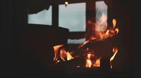 Burning Fire and Window Reflection in a Fireplace Protection Glass. 4K. 스톡 동영상 66735092