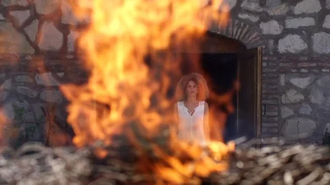 Burning fire beautiful gypsy bride slow motion wedding dress ceremony Stock Footage 81377582