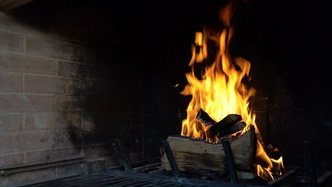 Burning fire in brick fireplace. Fire flames igniting and burning Stock Footage 116735890