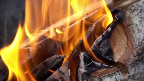 Burning fire close-up. Slow motion of flames on logs Stock Footage 84032821