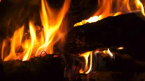 Burning fire - Closeup of flames burning at night camp fire - 4K Stock Footage 108986423