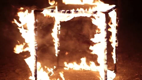 Burning fire cube at night. Video stock 77233179