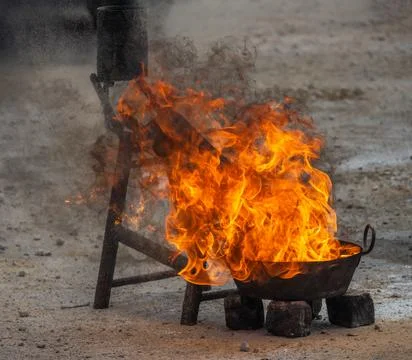 Burning fire in a fire pit Stock Photos