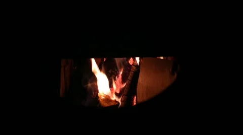 Burning fire in the fireplace from above. Stock Footage 168768045