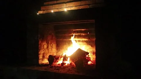 Burning Fire In The Fireplace with candles Stock Footage 157312588