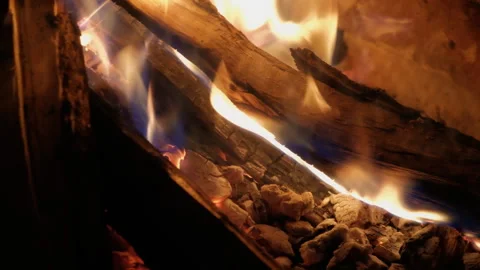 Burning Fire in the Fireplace Close Up Realtime Video stock 245448629