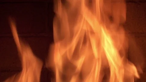 Burning fire in a fireplace Stock Footage 73499580