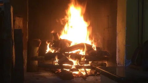 BURNING FIRE IN THE FIREPLACE Stock Footage 148860980