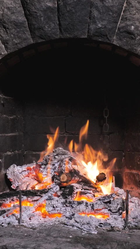 A burning fire in the fireplace Stock Footage 324583786