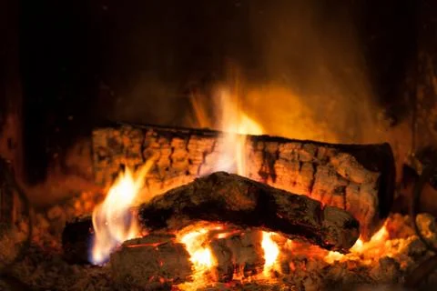 Burning fire in the fireplace Stock Photos