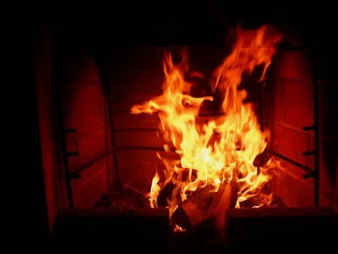 Burning fire in the fireplace Stock Photos