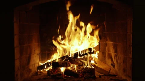 Burning Fire In The Fireplace. Slow Motion. A Looping Clip of a Fireplace with Stock Footage 209131665