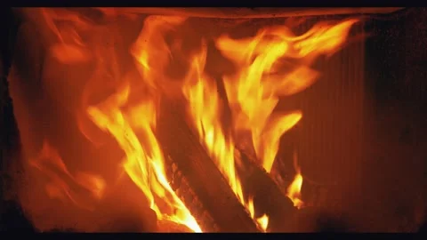 Burning fire in the fireplace. Winter and christmas holidays concept. 4k UHD Stock Footage 146447316