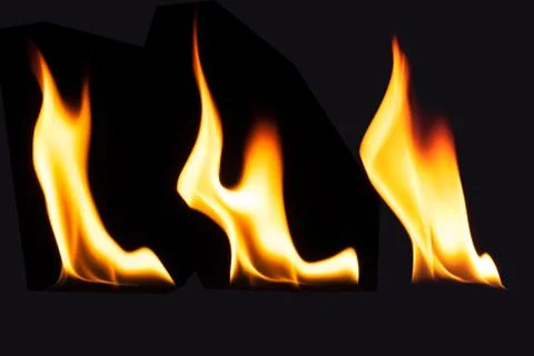 Burning fire flame on black background Stock Photos