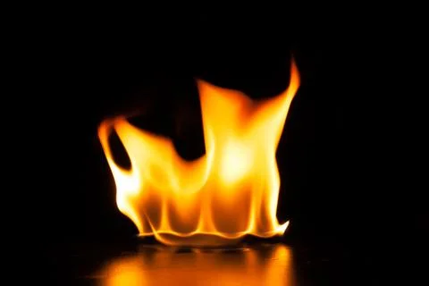 Burning fire flame on black background Foto stock