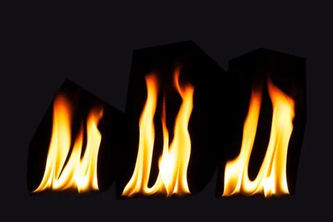 Burning fire flame on black background Stock Photos