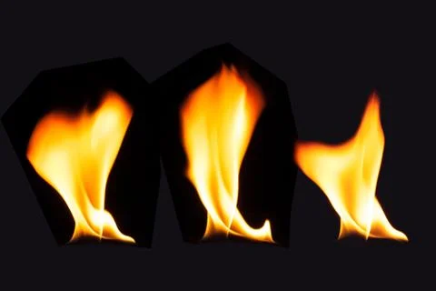 Burning fire flame on black background Stock Photos