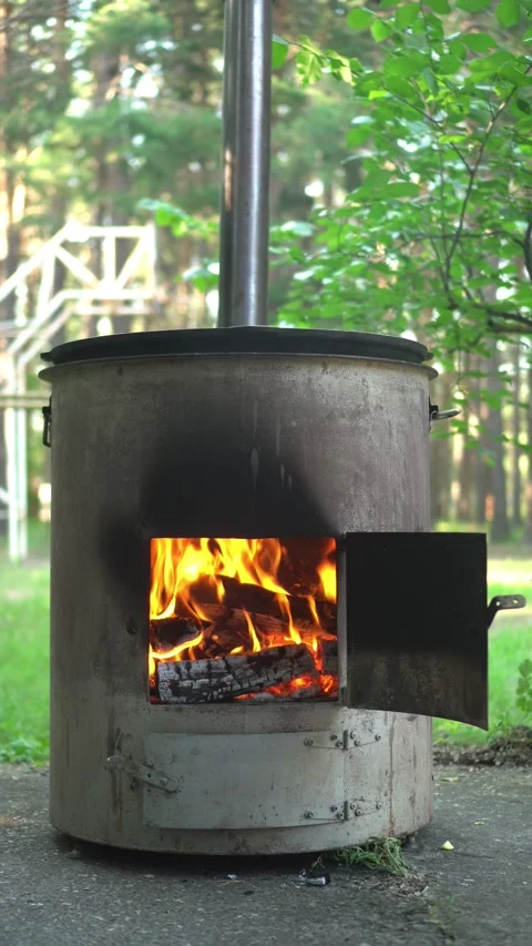 Burning Fire Inside a Metal Stove Close-Up Stock-Footage 343894567