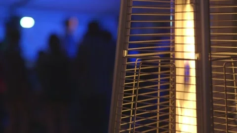 Burning fire lantern with dancing and live band performance in background Stock Footage 247331192