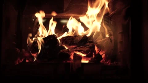 Burning fire logs inside stone fireplace. Close-up view. 스톡 동영상 257037344