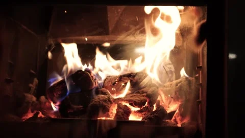 Burning fire logs inside stone fireplace. Close-up view. Stock-Footage 277497644
