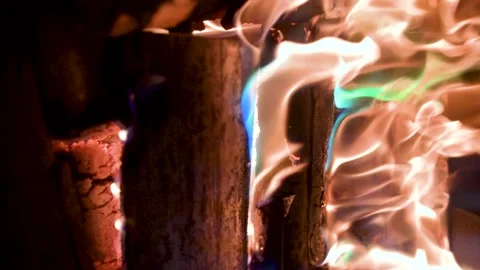 Burning fire logs inside stone fireplace. Close-up slow motion b-roll footage. 스톡 동영상 309801031