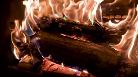 Burning fire logs inside stone fireplace. Close-up slow motion b-roll footage. 스톡 동영상 312183185