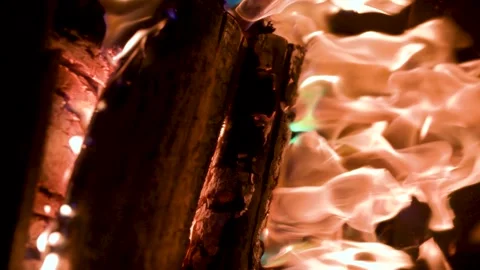 Burning fire logs inside stone fireplace. Close-up slow motion b-roll footage. 스톡 동영상 313442108