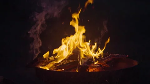 A burning fire made in the open air. Video stock 313299602