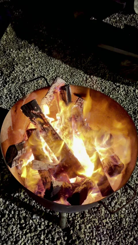 A burning fire at night outside in a camp. Stock Footage 329663582