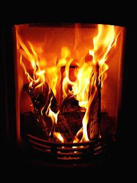 Burning fire in the oven Stock Photos