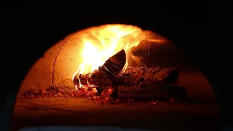 Burning fire in the pizza oven. Stock Footage 202249159
