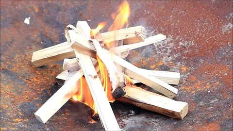 Burning fire starter wood, campfire Stock Footage