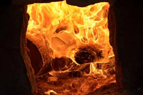 Burning fire in the stove Stock Photos