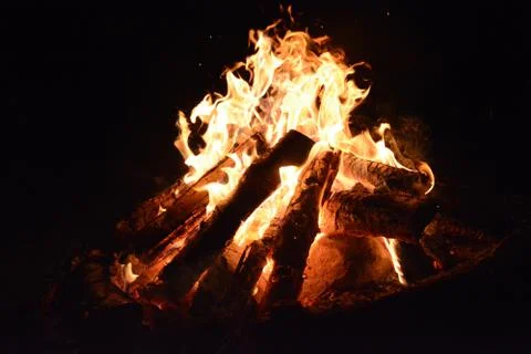 Burning fire on a summer evening screen saver for the monitor Stock Photos