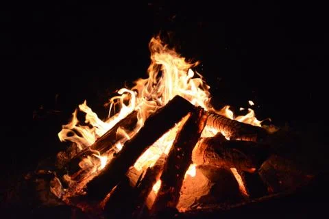 Burning fire on a summer evening screen saver for the monitor Stock Photos