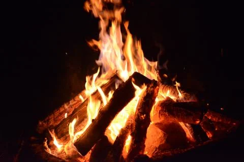 Burning fire on a summer evening screen saver for the monitor Stock Photos