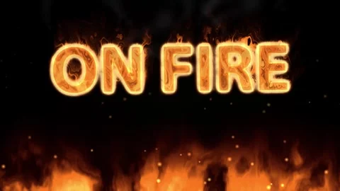 Burning On Fire Text Animation with Ground Flames and Rising Sparks Stock Footage 345316930