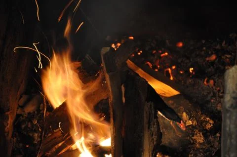 Burning fire texture with flames and sparks Stock Photos