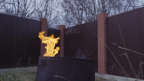 Burning Fire in the Warming Barrel Stock Footage 122346462