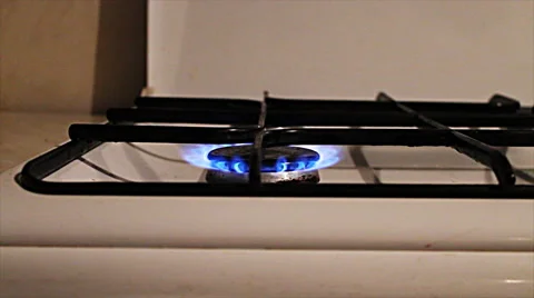 Burning fire on a white tile for cooking Stock Footage 68615184