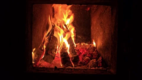 Burning Fireplace Logs Close-Up with Warm Flames and Glowing Embers Video stock 320710446